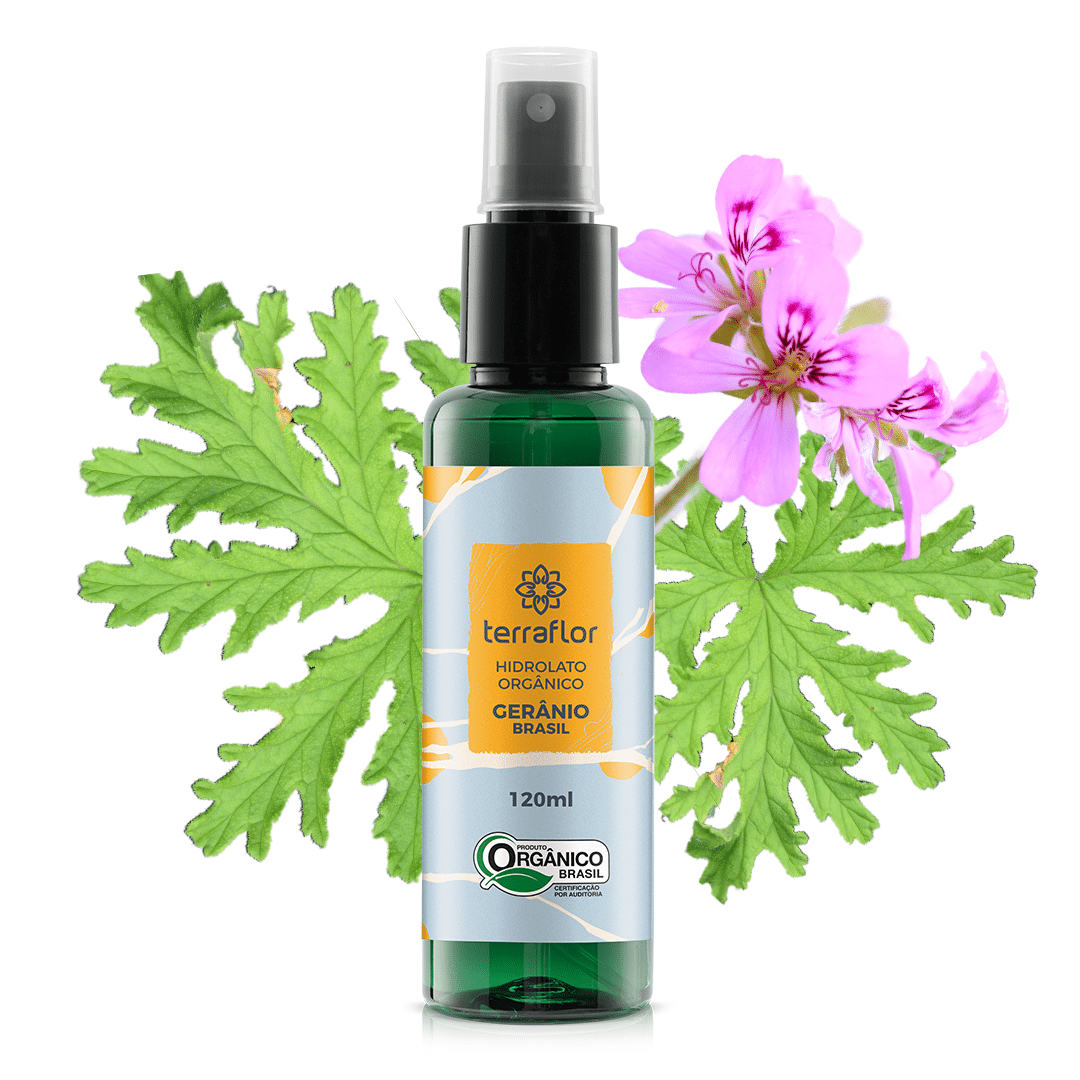 Hidrolato de Gerânio Brasil Orgânico Frasco do hidrolato de gerânio brasil orgânico com a planta ao fundo.